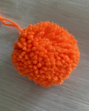 Pompon en laine – orange fluo